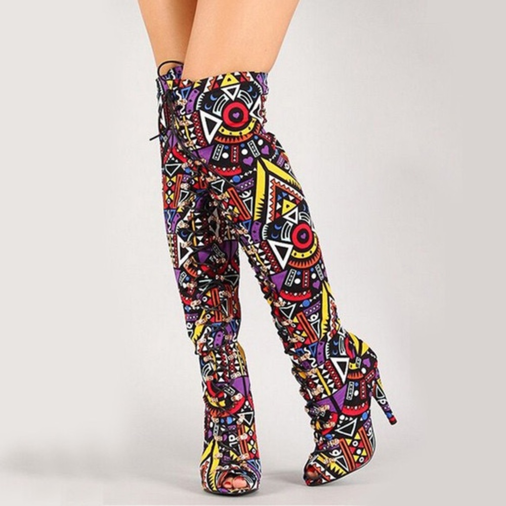 Brand new, never been worn Python Fever Boots in Multi Color Tribal Print